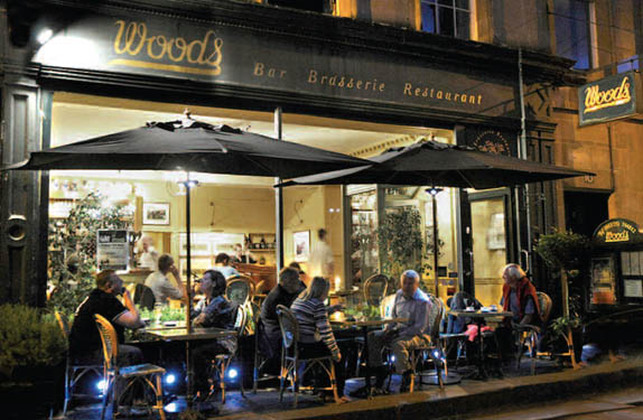 Woods Restaurant on Alfred Street at night