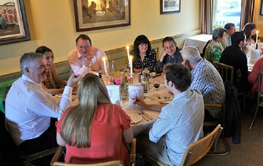 Guests dining together at Woods